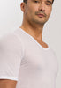 Close-up view of a men model wearing HA white cotton S/SLV Shirt