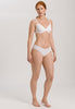 Full-body view of a women model wearing HA white cotton Midi Briefs