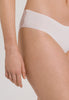 Close-up view of a women model wearing HA white cotton Midi Briefs